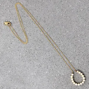 Fortuitous Pearl-Set Gold Horseshoe Pendant