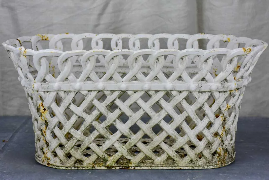 Pair of antique French woven iron plant stands
