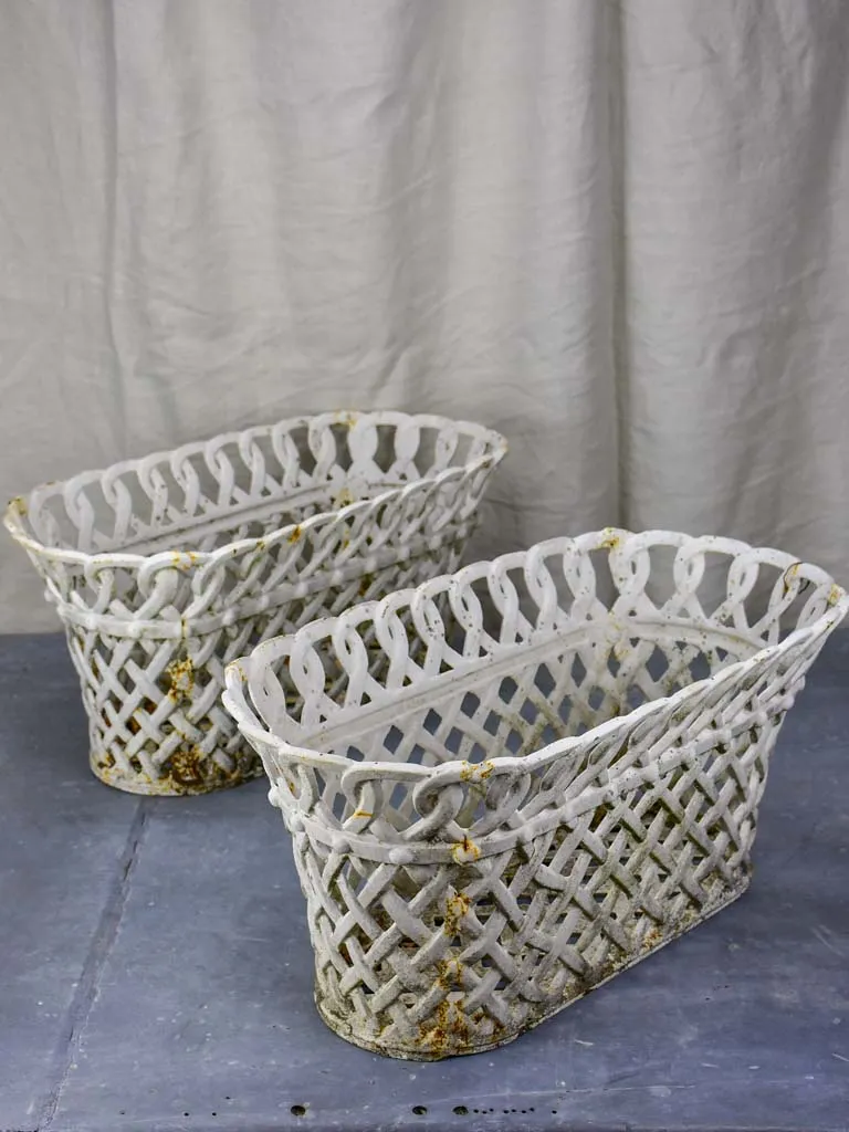 Pair of antique French woven iron plant stands